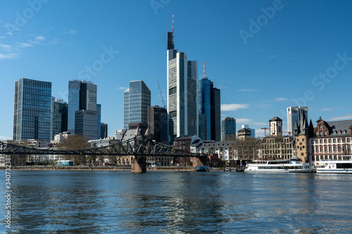 Frankfurt, Germany - March 31, 2020: frankfurt skyline view from main riverside in springtime