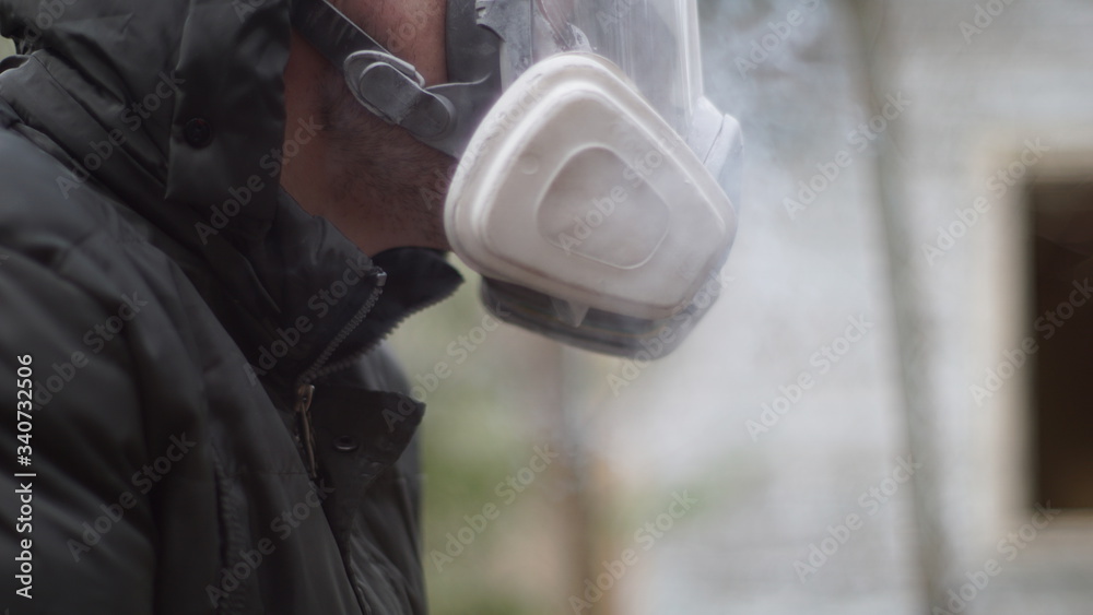 Man in a respiratory mask Man in a respiratory mask