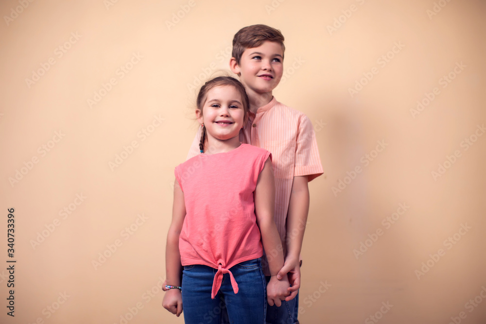 A portrait of happy children boy and girl. Childhood and frendship concept