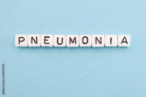 word composed with cubes on a blue background