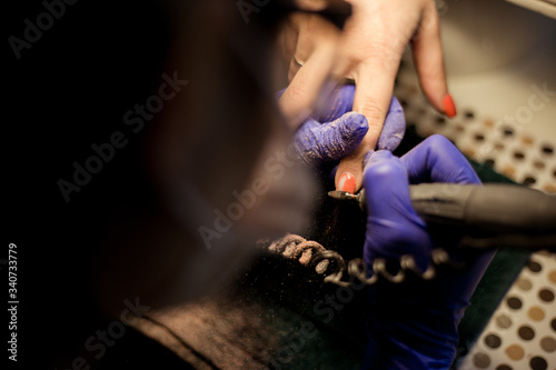 Women do manicures at home. Self-isolation manicure. Nail salon