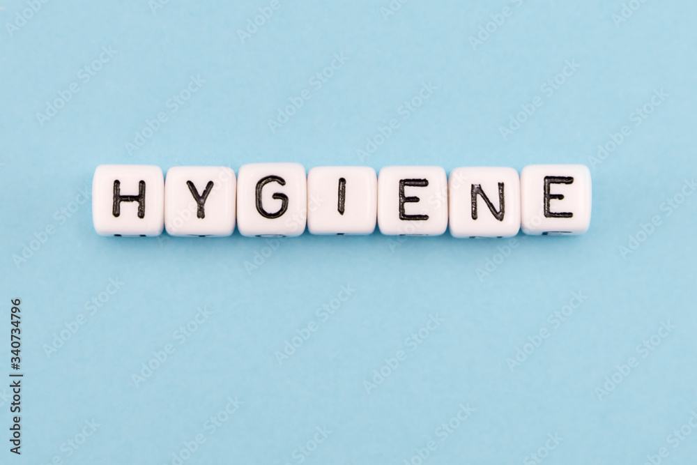 word composed with cubes on a blue background word composed with cubes on a blue background