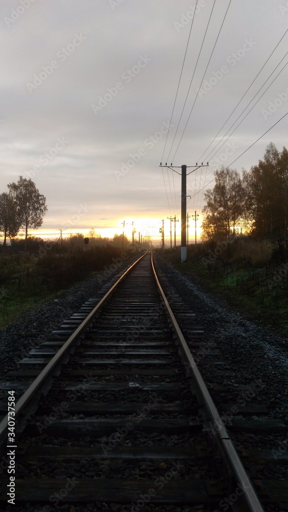 Fototapeta premium Railroad on sunset background