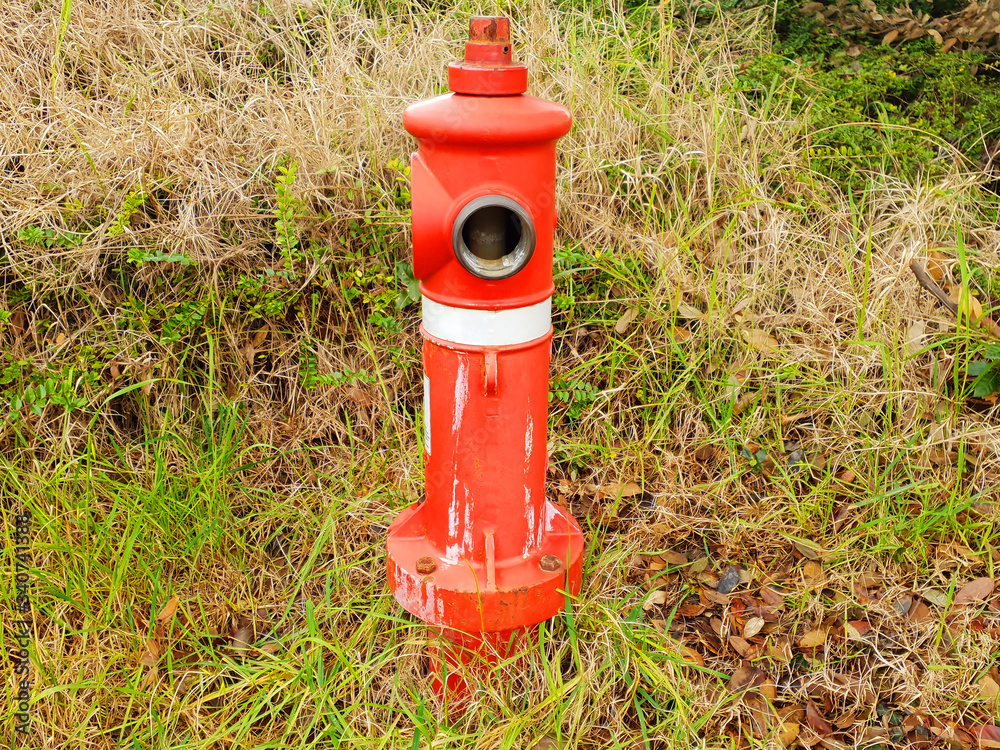 Red fire hydrant on grass background. Red fire hydrant on grass background.