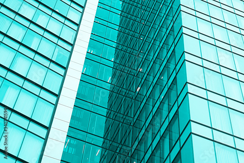 Windows of skyscraper in Tel Aviv, Israel. Teel filter photo