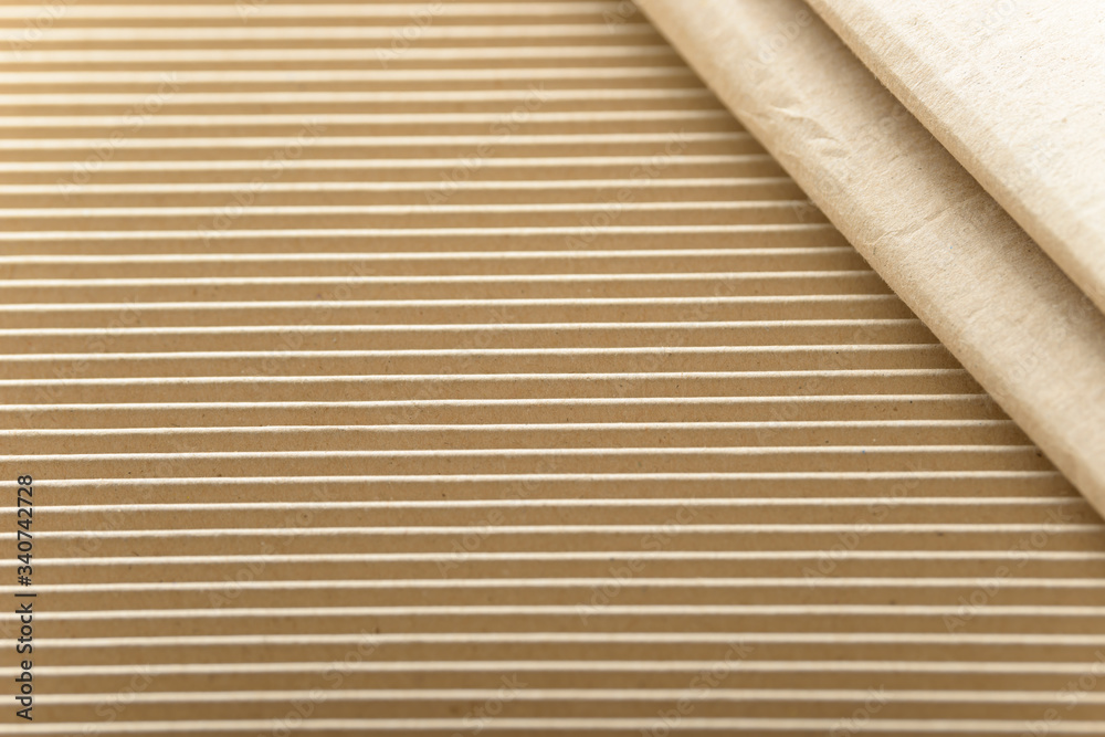 Carton or cardboard packing material. Texture of corrugated paper sheets made from cellulose