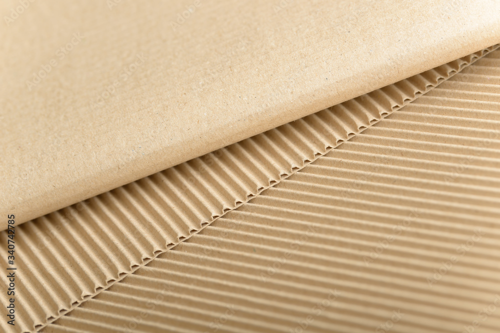 Carton or cardboard packing material. Texture of corrugated paper