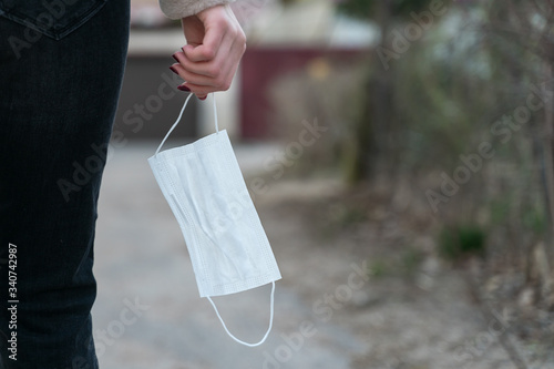 disposable white surgical mask to protect against infection photo