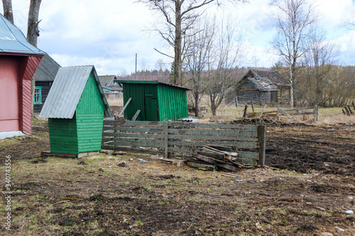 old wooden house in the small village in russian outback