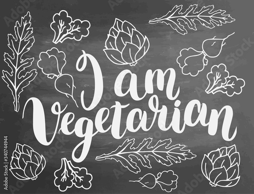 I am vegetarian lettering. Set of vector handwritten elements. Food farm natural product. Ink brush handlettering. Hand drawn fruits and vegetables on Chalkboard background