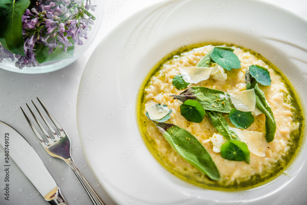 Potato risotto with goat cheese, rice, wild garlic Potato risotto with goat cheese, rice, wild garlic