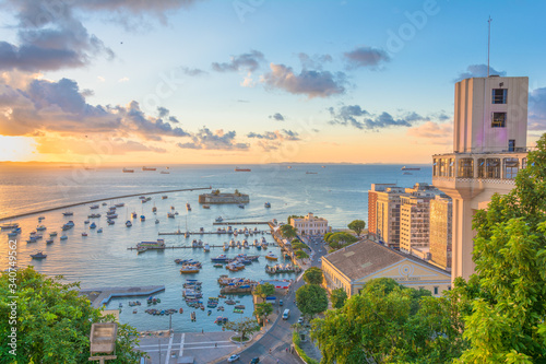 beautiful view from the Lacerda Elevator to Fort São Marcelo in Todos os Santos Bay in the city of salvador on a sunset overlooking the sea and blue sky photo