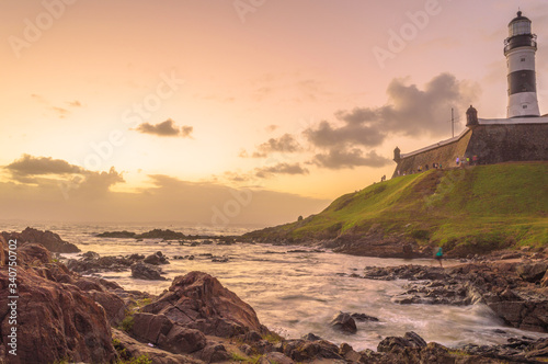 Barra Lighthouse in front of the sea in the city of Salvador Bahia at sunset