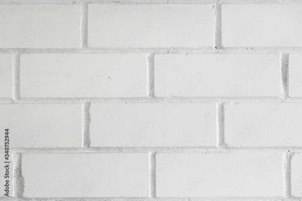 Fototapeta premium the texture of a white brick wall is large