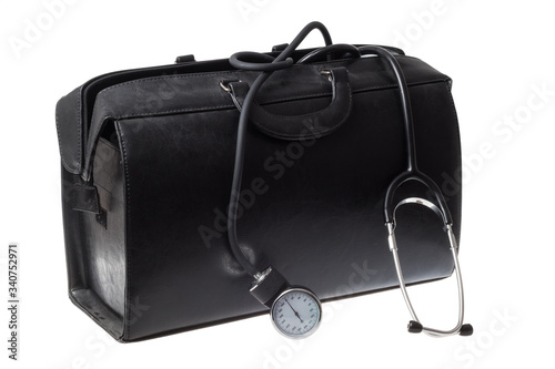 Doctor suitcase hand bag, made of black leather. For medical instruments with blood pressure gauge and stethoscope. Isolated on white background