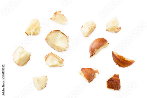 broken hazelnuts isolated on a white background. top view