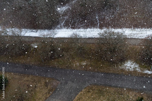 sidewalks in snowfall from above © K. Dufva