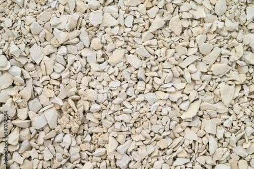 White clay powder texture. Close up. Ural food clay. Texture. Background. top view. Flat lay. No people. Selective focus