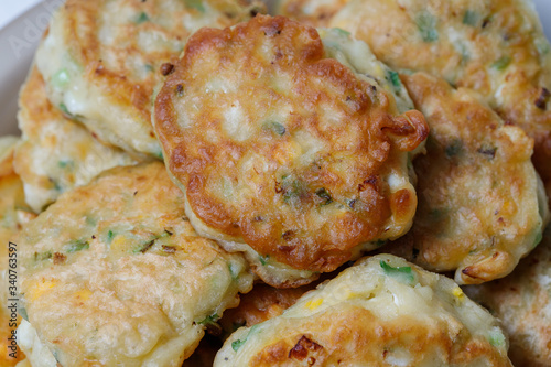 Fried pastry with egg and green onion