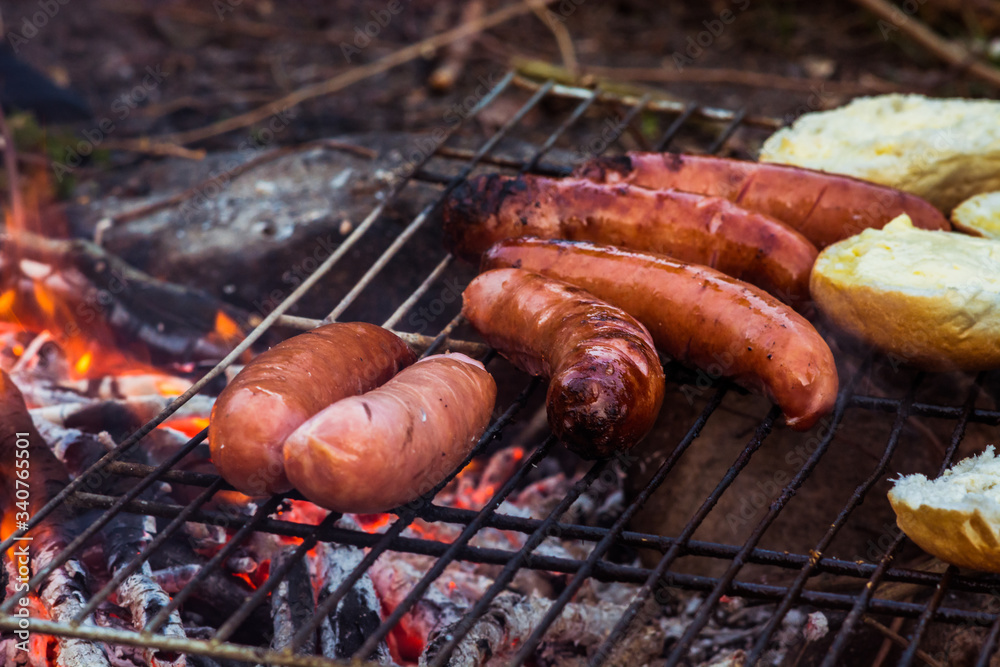 Delicious polish sausages cooked directly on the fireplace.