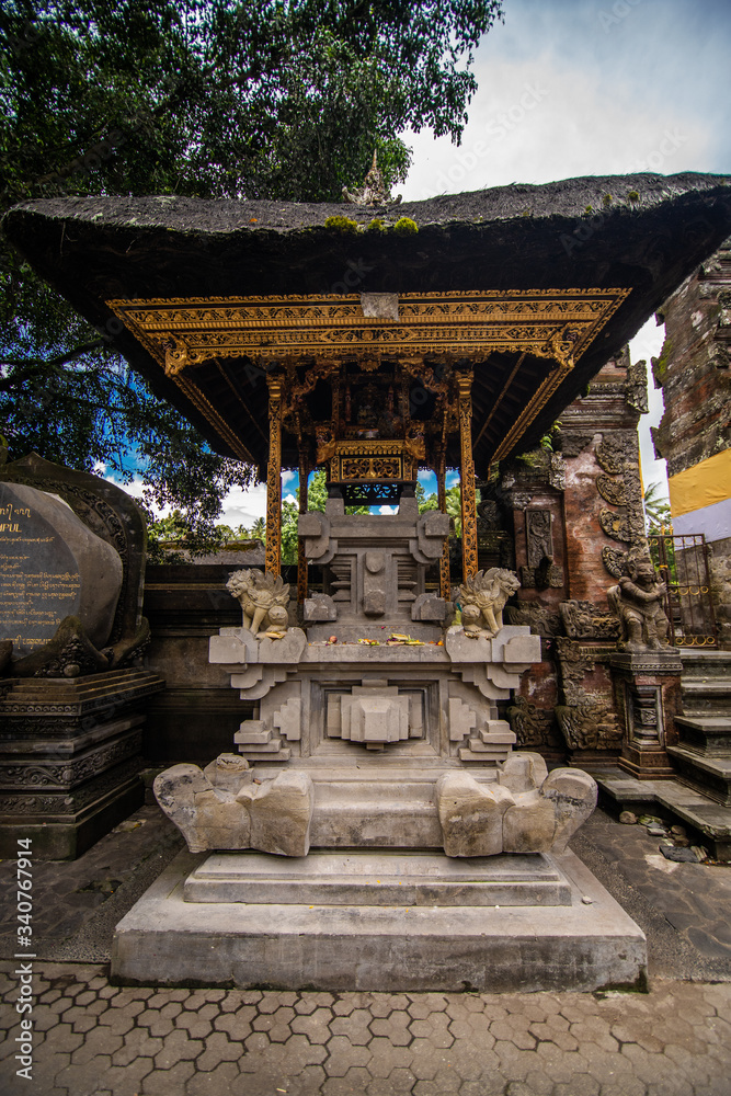 Bali, Indonesia - February, 2020: Pura Tirta Empul temple. Architecture of traditional balinese temples. The most famous temple on the island of Bali Bali, Indonesia - February, 2020: Pura Tirta Empul temple. Architecture of traditional balinese temples. The most famous temple on the island of Bali