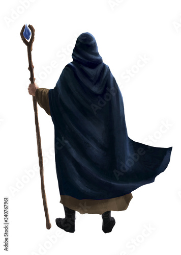 Mage sorcier avec batôn magique et cape vu de dos photo