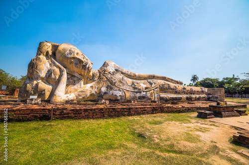 Lotus Flowers Supporting the Reclining Buddha's Head at Wat Lokaya Sutha, Phra Nakorn Sri Ayutthaya, Thailand. UNESCO World Heritage Site.