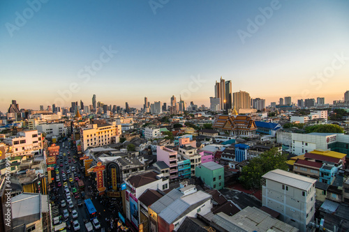 Bangkok, Thailand - February 2020: Above view from rooftop on China town in the middle of city Bangkok, Thailand
