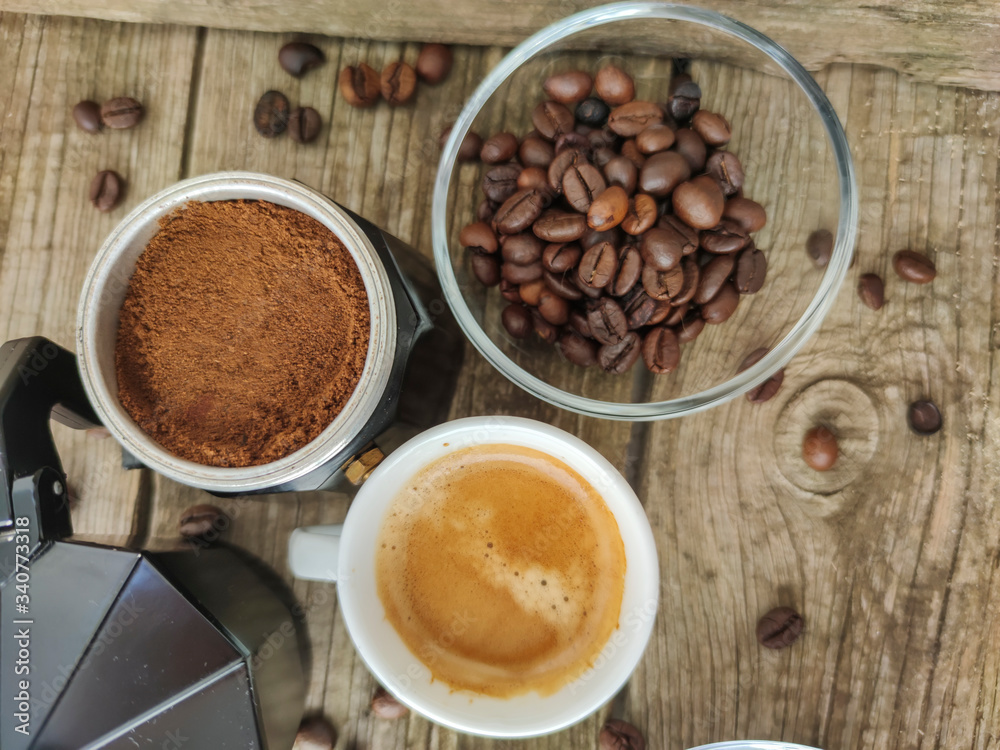 Cup and grain of coffee Cup and grain of coffee