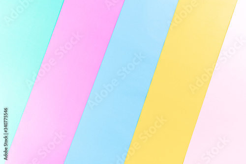 Bright colorful paper background with copy space for summer concept. Flat lay.
