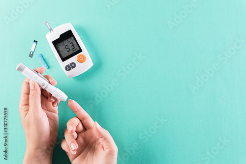 Healthcare and medical concept, The diabetic measures the level of glucose in the blood. World Diabetes day, 14 November.