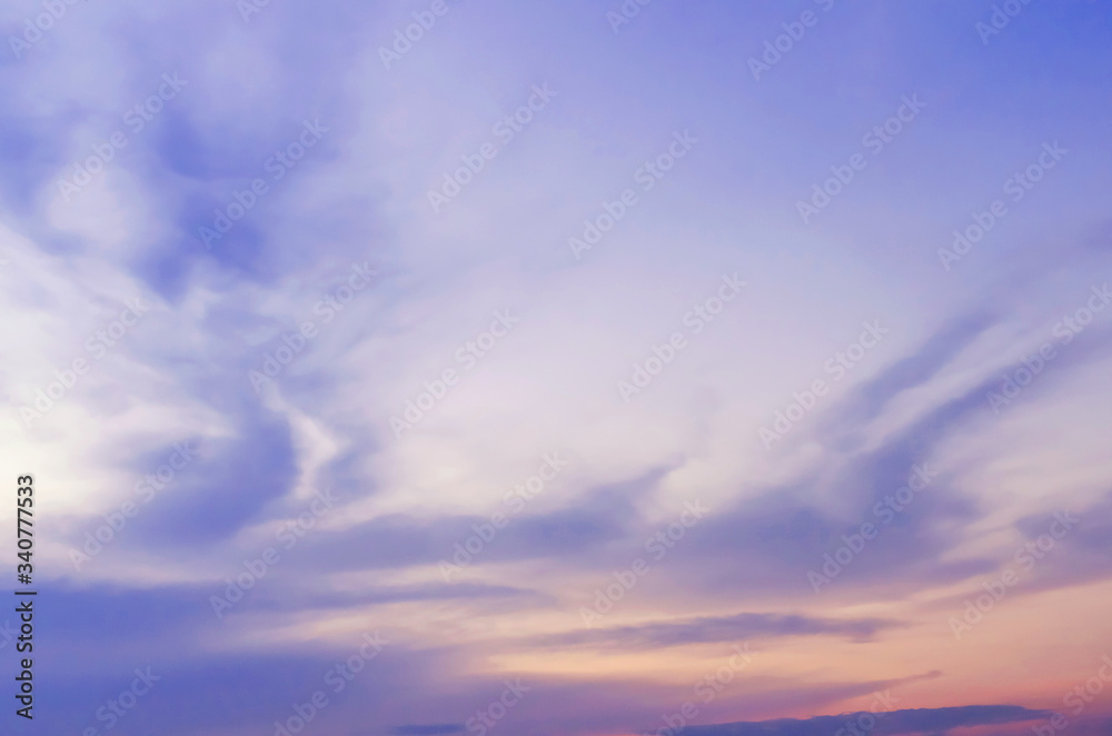 Sky background on sunset. Nature abstract composition,Bright orange sky and light of the sun.
