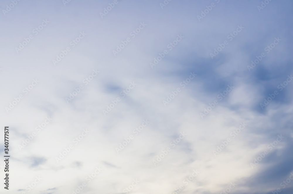 Naklejka premium Sky background on sunset. Nature abstract composition,Bright orange sky and light of the sun.