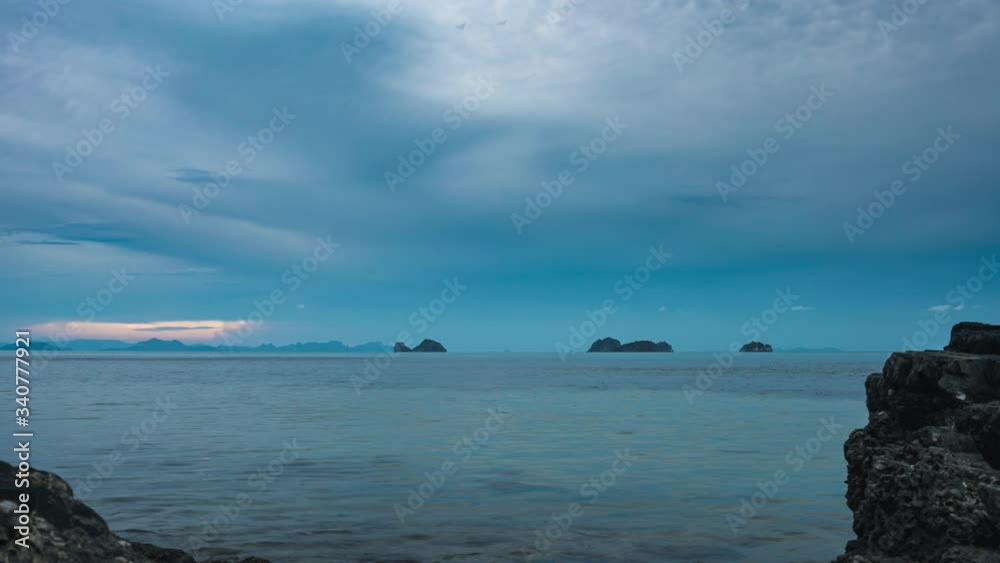 Dramatic sunset over cliffs and islands in Thailand Dramatic sunset over cliffs and islands in Thailand