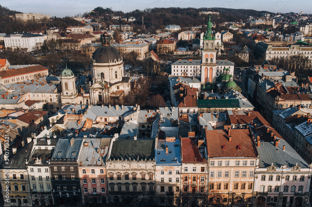 View of the old city from above, from the observation tower of the town hall. Lviv, Ukraine, winter panorama.