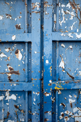 rusty blue metal door