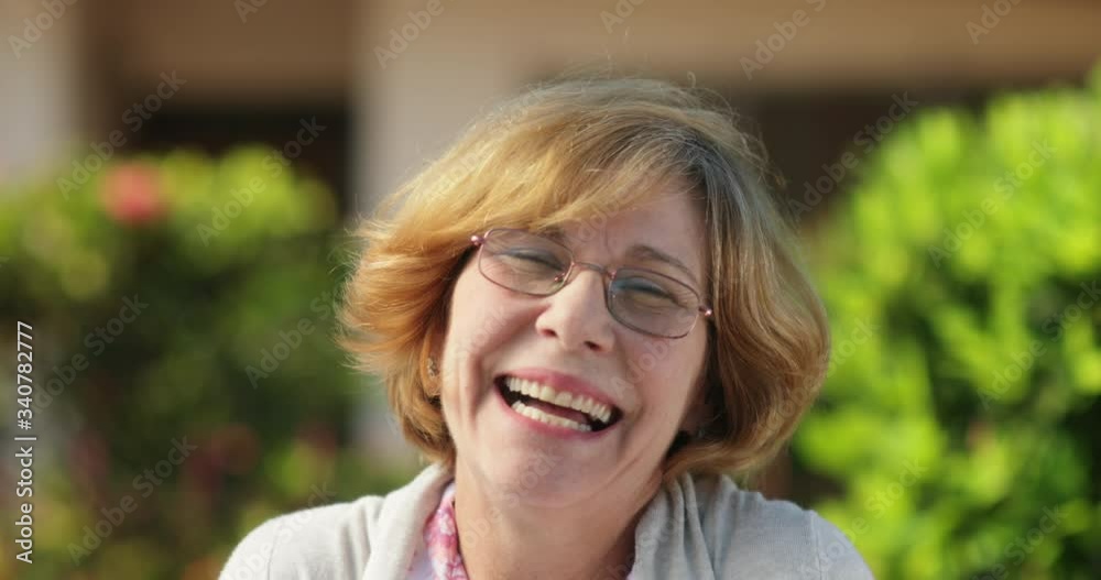 Slow Motion Portrait Close Up Smiling Senior Woman With Glasses Slow Motion Portrait Close Up Smiling Senior Woman With Glasses