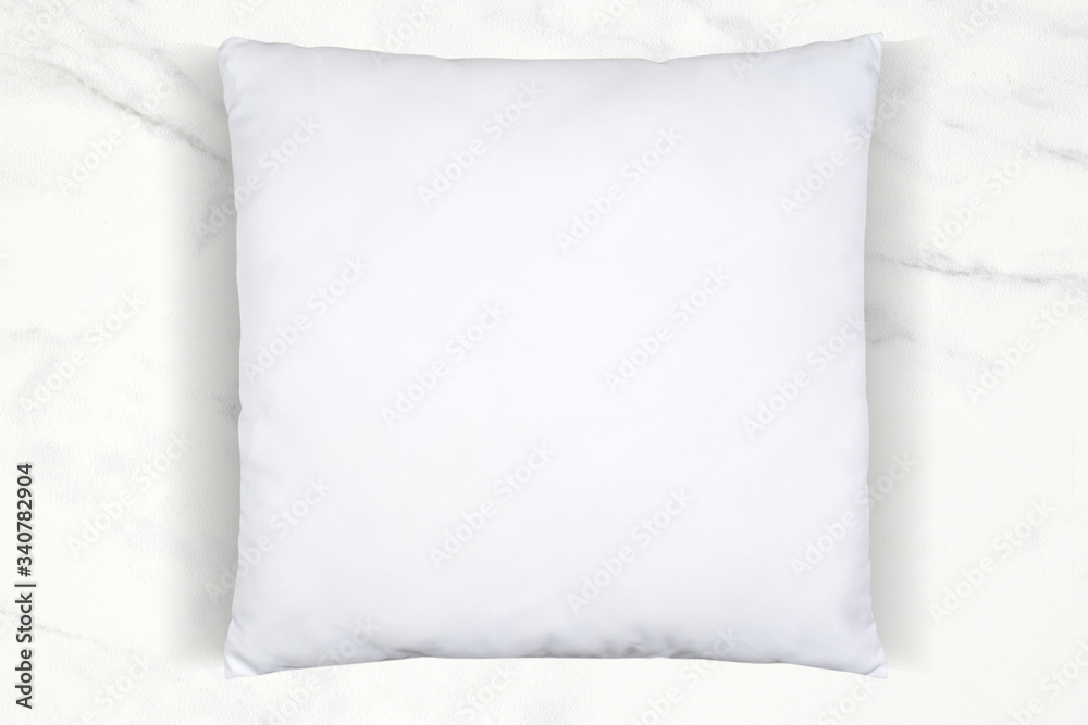 Obraz premium Throw Pillow Mockup on Elegant White Marble Background