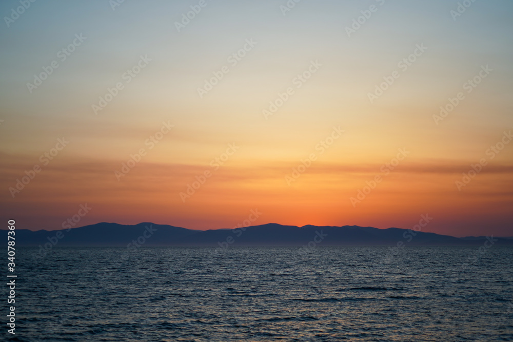 Seascape with sunset over the sea.