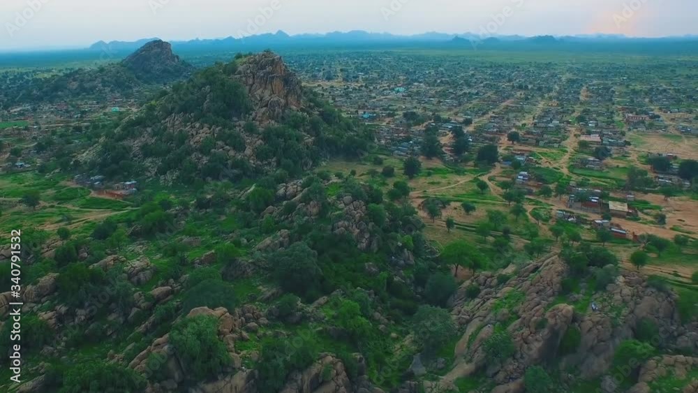remote village in mountainous region of south sudan (aerial photography)