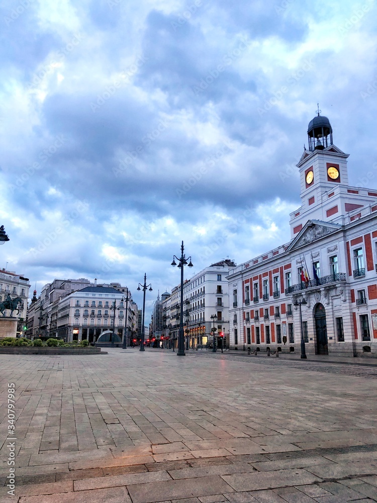 COVID-19 European cities shutdowns. Image of Empty Puerta del Sol of Madrid city in Spain