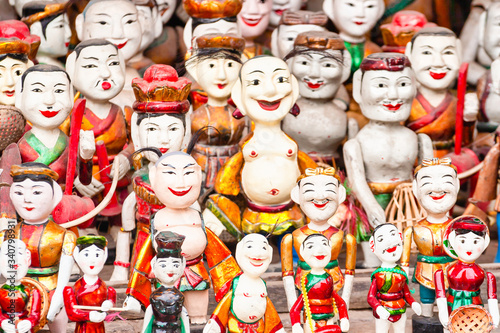 Traditional wooden puppets of the water theatre in a souvenir shop.Each puppet represents one character in the normal life in the past.