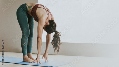 Yoga instructor at a minimal studio photo
