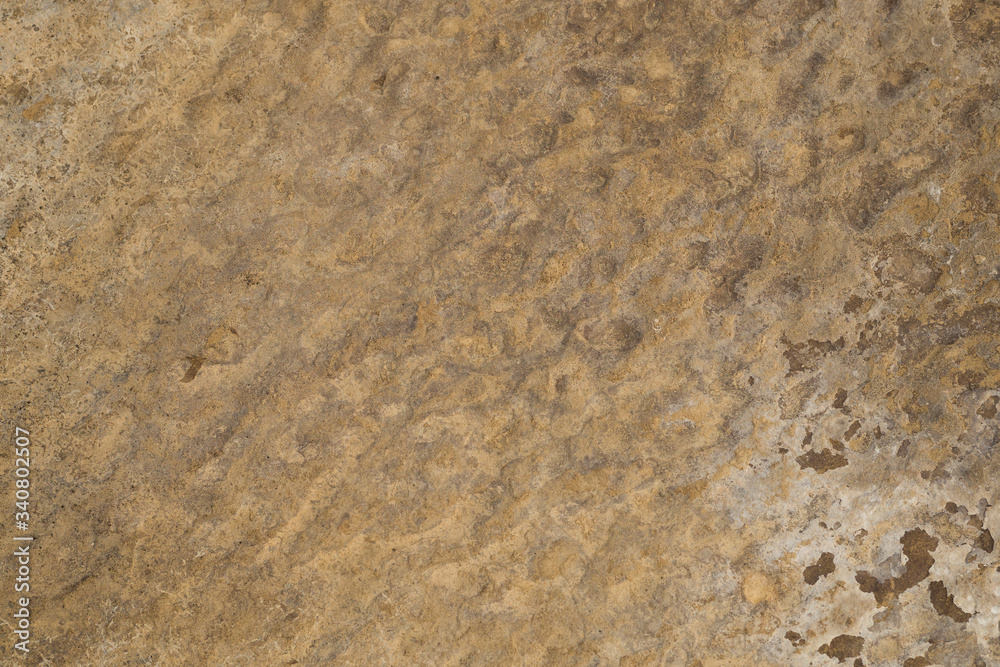 The texture of the surface of the stone slab. Natural stone. Background. The texture of the surface of the stone slab. Natural stone. Background.