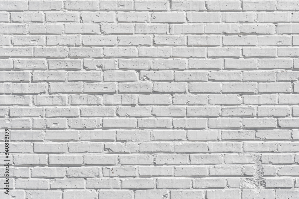 White painted brick wall for texture or background White painted brick wall for texture or background