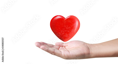 Hands holding red heart. heart health. and donation concepts