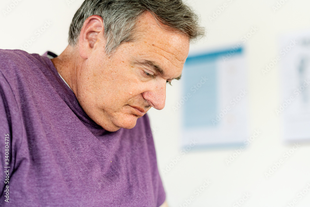 Obraz premium Tired man at the gym