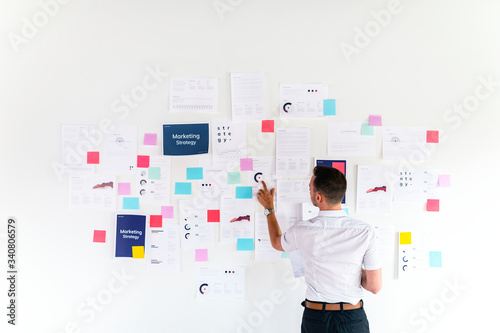 Business person working with notes photo