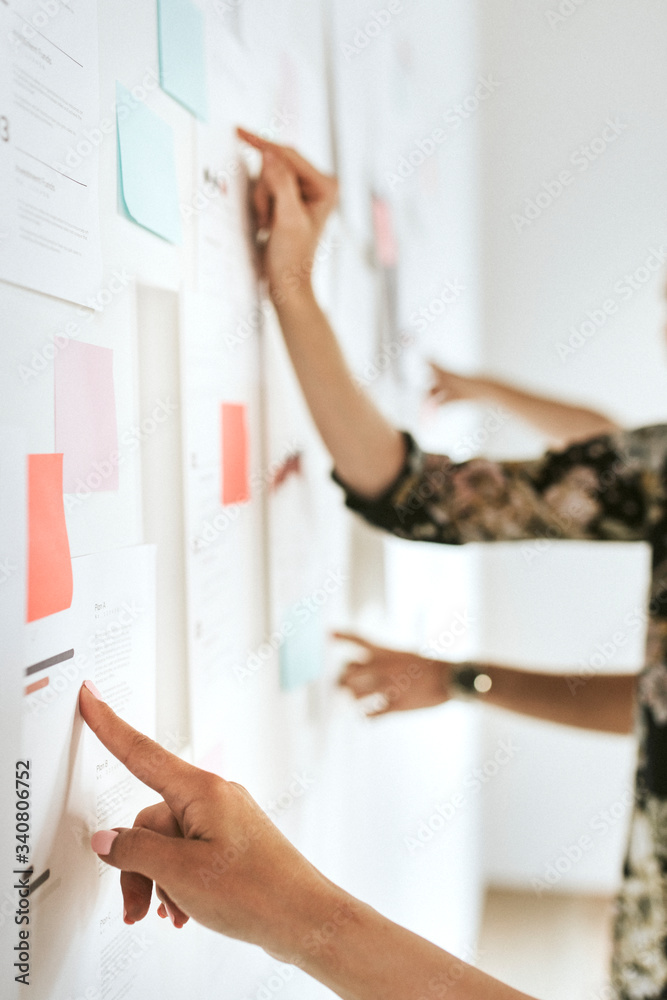 Woman working on sticky notes Stock Photo Adobe Stock