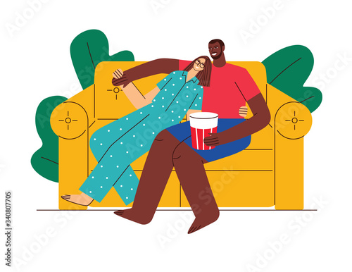 Colored vector flat style illustration. Loving couple watching TV at home. Husband and wife spend time together. A guy and a girl of different nationalities. Couple at home on self isolation